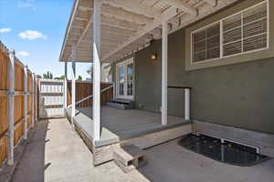 Covered side porch off main floor kitchen