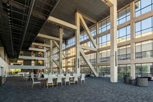 View of gathering area for parties with attached kitchen.