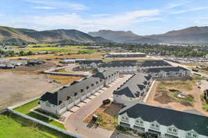 Birds eye view of property with a mountain view