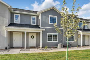 View of front of home featuring a front lawn