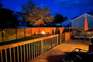 Night / Deck & backyard fireplace meeting area