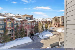 Snow covered property featuring a mountain view