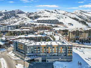 Snowy aerial view with a mountain view