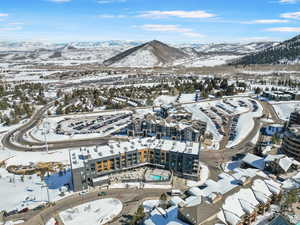 Snowy aerial view with a mountain view