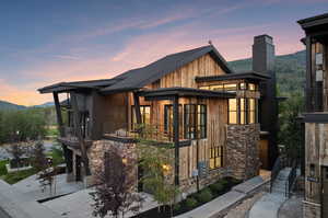 Exterior space featuring a balcony and a mountain view