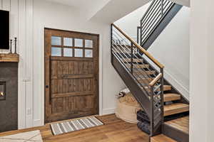 Foyer entrance with dark wood-type flooring