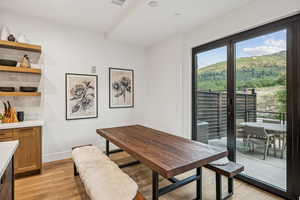 Dining room with light wood-type flooring