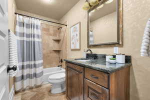 Full bathroom with shower / bath combination