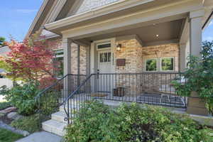 Property entrance featuring covered porch