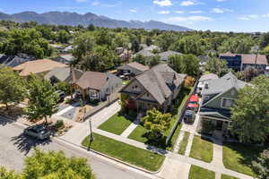 Birds eye view of property with a mountain view