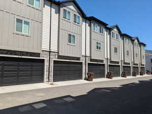 View of building exterior with a garage