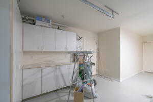 Interior space with white cabinets