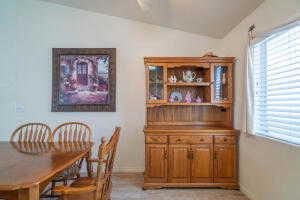 Dining room featuring vaulted ceiling