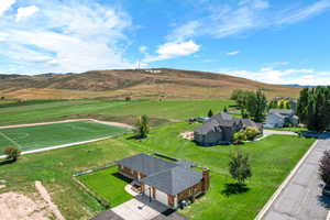 Drone / aerial view featuring a rural view and a mountain view