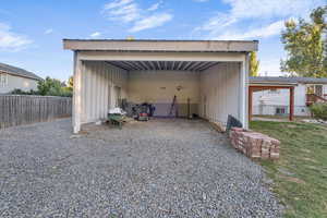 Storage carport on the back of garage