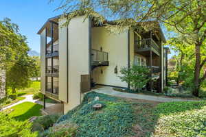 Back of house featuring a balcony