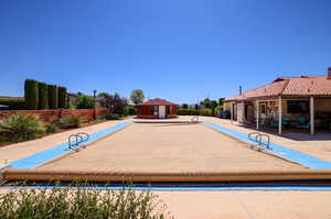 View of swimming pool with a patio area