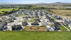 Birds eye view of property with a mountain view