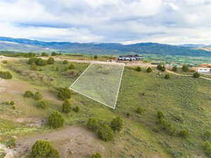 Aerial view with a mountain view and a rural view