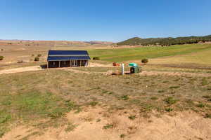 Exterior space with a rural view and a mountain view