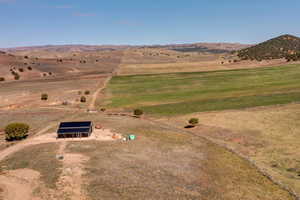 Drone / aerial view featuring a rural view and a mountain view