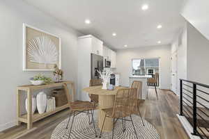 Dining area featuring hardwood / wood-style floors