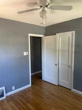 Back bedroom with hardwood floors