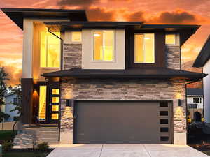 View of front of home with a garage