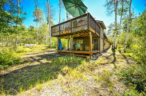 Exterior space featuring a wooden deck