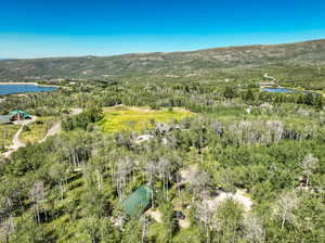 Bird's eye view with a water and mountain view