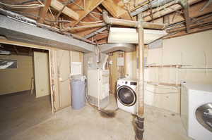 Basement featuring independent washer and dryer