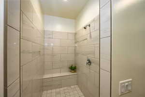 Bathroom with tiled shower