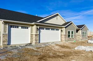 Craftsman-style home with a garage