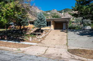 View of front of property featuring a mountain view