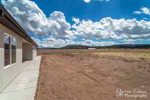 Charming Farmhouse with Stunning Mountain Views | Backyard Looking East