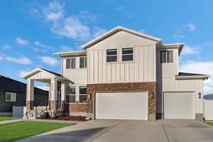 View of front of home featuring a garage