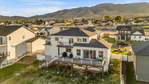 Exterior space featuring a balcony and a mountain view