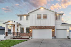 View of front of home with a garage