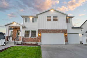 View of front of property with a garage