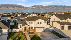 Aerial view featuring a water and mountain view