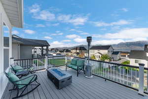 Wooden deck with an outdoor fire pit