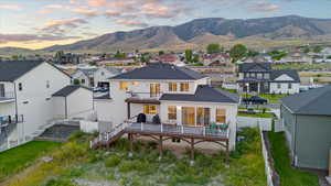 Back house at dusk with a mountain view