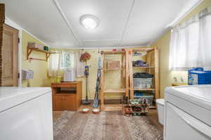 Storage room featuring washer / clothes dryer