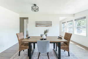 Dining room featuring wood-type flooring