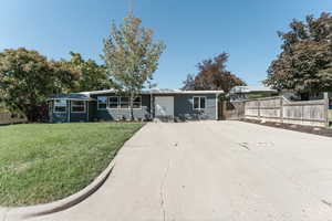 View of front of home featuring a front lawn