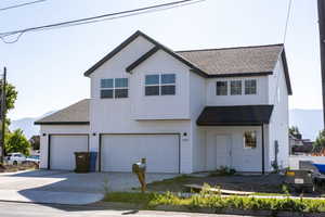 View of front of home with a garage