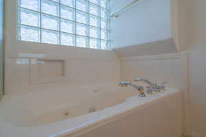 Bathroom featuring a bathing tub