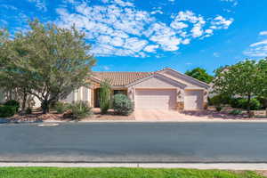 View of front facade featuring a 3 car garage