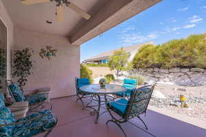 View of patio with ceiling fan