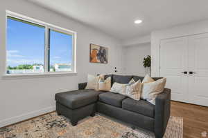 Living room featuring hardwood / wood-style flooring